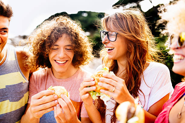 istock Friends Eating Burgers 509317001