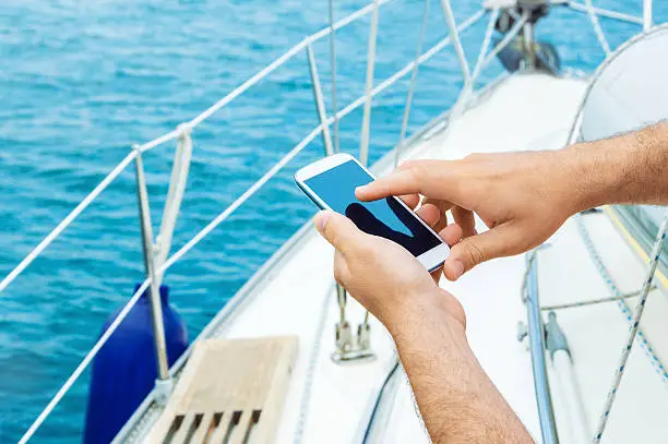 Photo of Male hands showing a blank smart phone