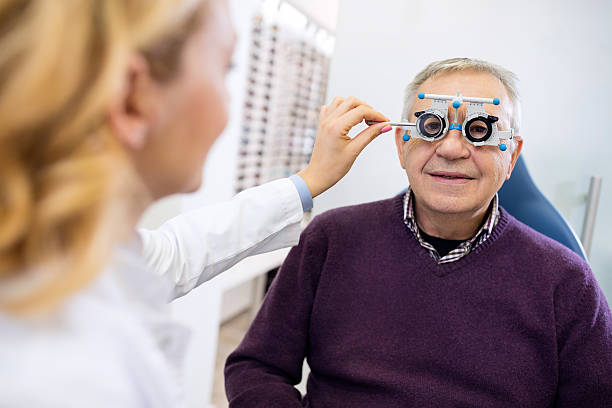istock Male senior examine eyes 509317512