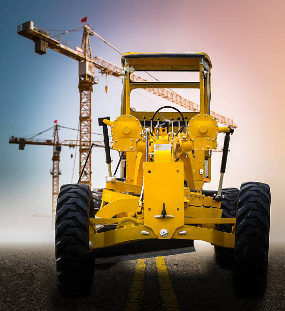 istock old yellow motor grader on the road 509318775