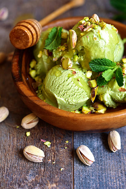 istock Pistachio ice cream with chopped nuts and honey. 509342768