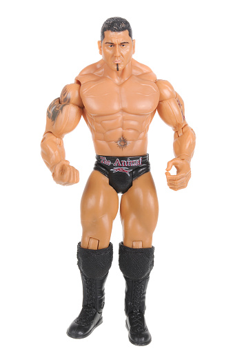 Adelaide, Australia - February 9, 2016: A Batista - A studio shot of The Animal WWE Action Figure isolated on a white background. Wrestling is a popular sport worldwide and merchandise from the sport are highly sought after collectables.