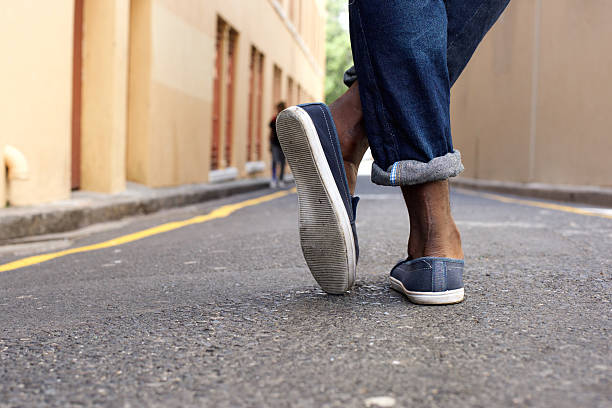 istock Man standing with crossed legs 509343710