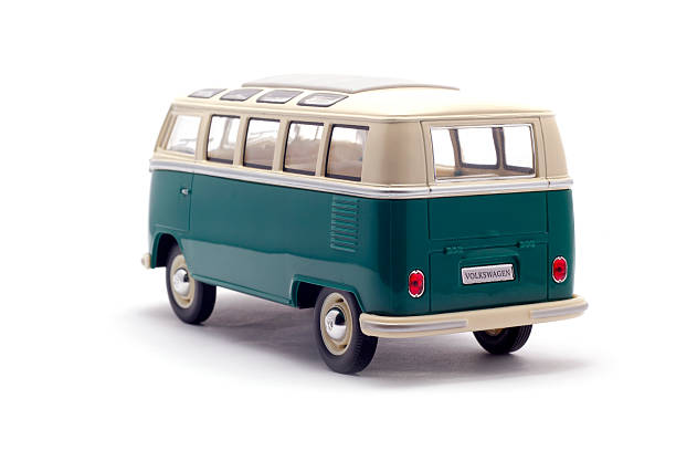 Izmir, Turkey, February 05, 2013: Vintage toy minibus in front of a white background. The Volkswagen Type 2, known officially (depending on body type) as the Transporter, Kombi or Microbus, or, informally, as the Bus (US) or Camper (UK), is a panel van introduced in 1950 by the German automaker Volkswagen as its second car model.