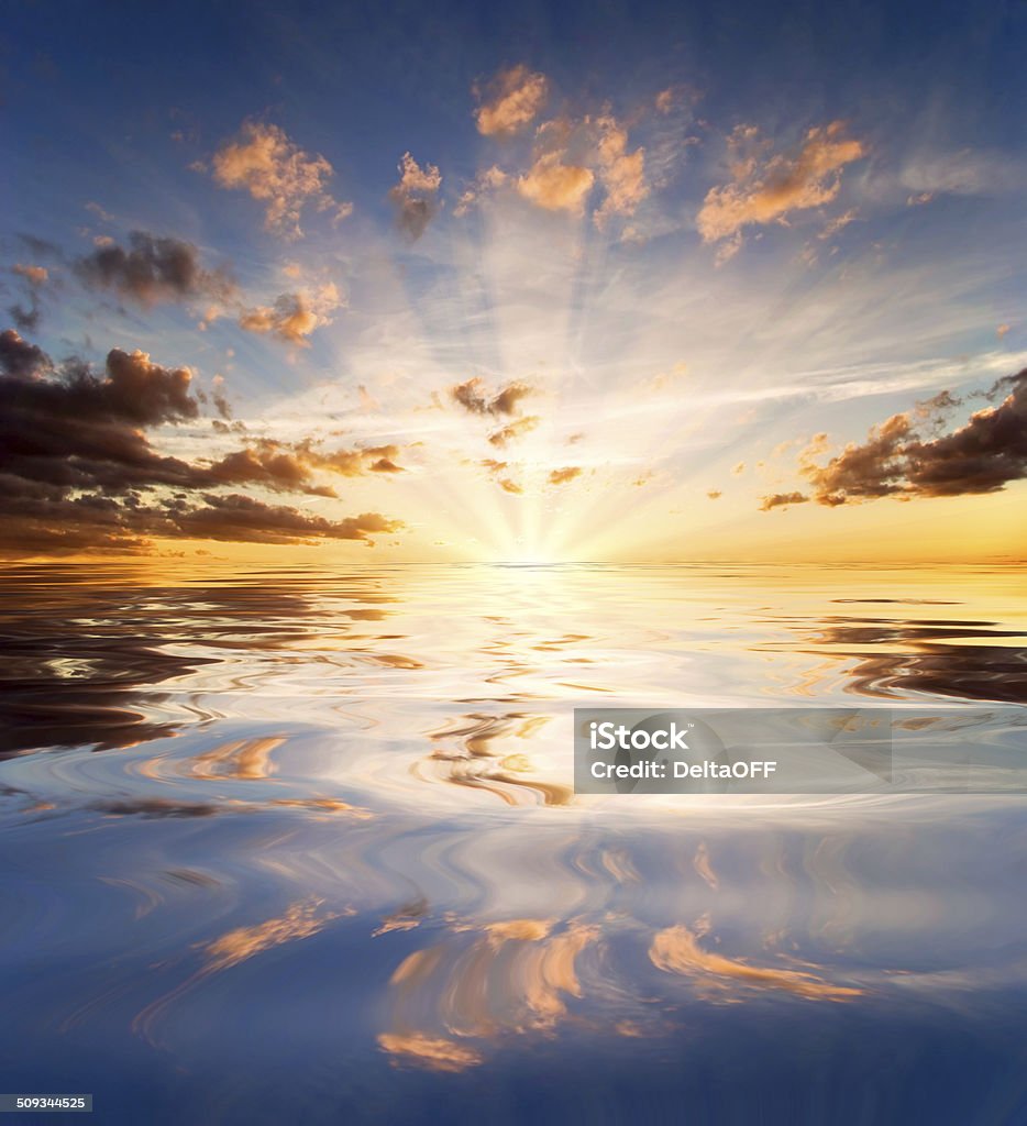 Reflections of sunset in lake water Reflections of sunset in surface lake water Heaven Stock Photo