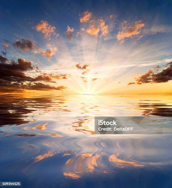 Reflections Of Sunset In Lake Water Stock Photo - Download Image Now - Heaven, Sunset, Lake