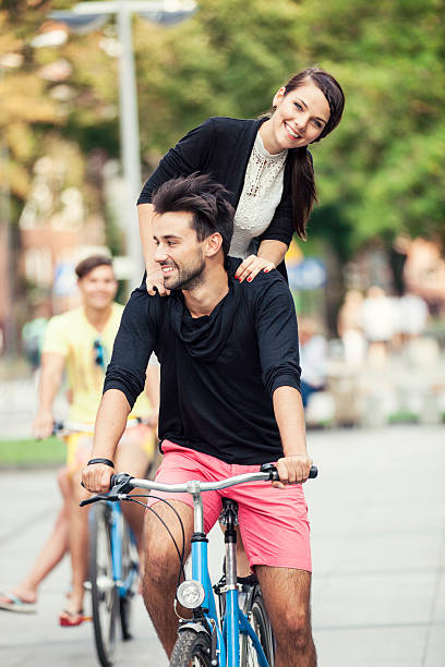 istock Happy Couple Riding Bicycle 509344817