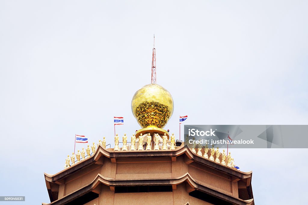 Top of temple Tamnak Phra Mae Kuan-Im Top of temple Tamnak Phra Mae Kuan-Im in Bangkok Ladprao with golden sphere and many golden buddhas, chinese styled. Architecture Stock Photo
