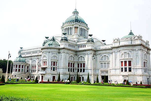 Bangkok, Thailand - April 23, 2014: Asian tourists are walking around Ananda Samakhom Throne Hall in Bangkok. Famous building opposite to zoo.