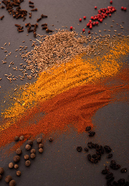istock Mix of spices on black board 509347828