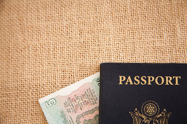 istock Travel background. Passport, money on burlap. 509348786