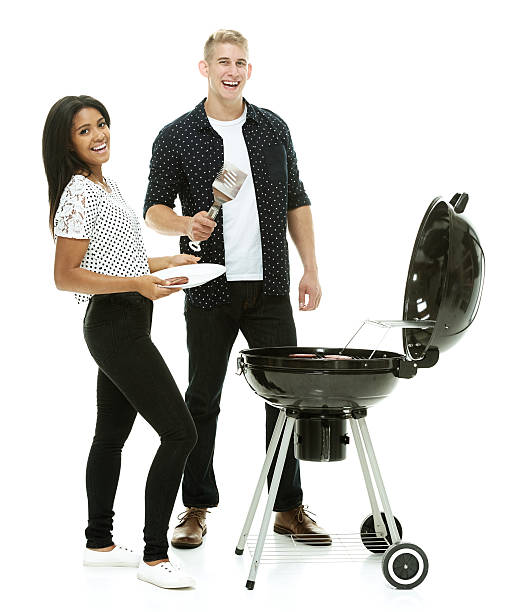 istock Couple together by the barbecue grill 509349486