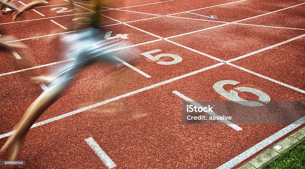 crossing the finish line as winner Finish Line Stock Photo