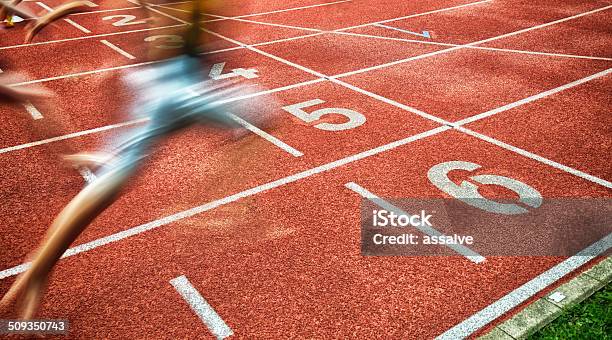 Crossing The Finish Line As Winner Stock Photo - Download Image Now - Finish Line, Running, Defocused
