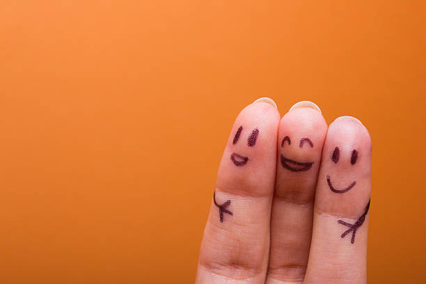 istock three smiling fingers that are very happy to be friends 509351846
