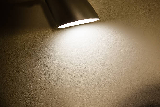 istock The lamp lighting on the concrete wall 509353354