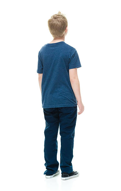 istock Rear view of little boy standing and looking away 509353648