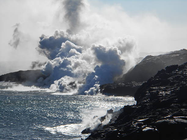 Lava Flowing into Pacific Ocean on Big Island, Hawaii.