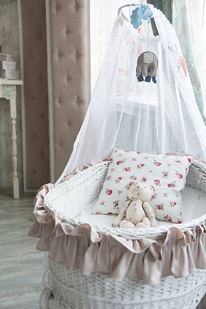 istock Retro interior children's bedroom with a wicker crib 509358940