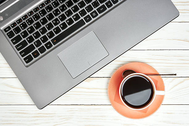 istock Office desk table with laptop and coffee cup 509361162