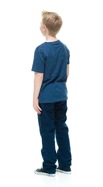 istock Rear view of little boy standing and looking away 509361200