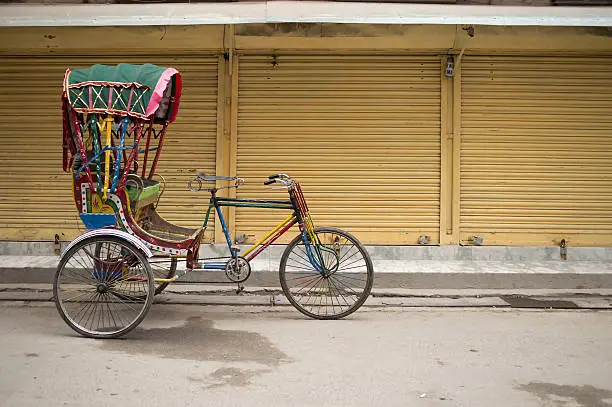 Traditional nepalese rickshaw parked on the street