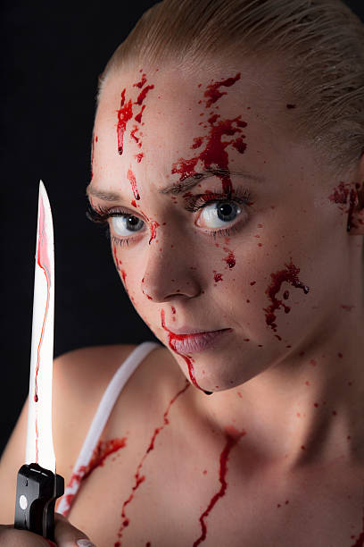 istock Girl With A Bloodstained Knife 509364203