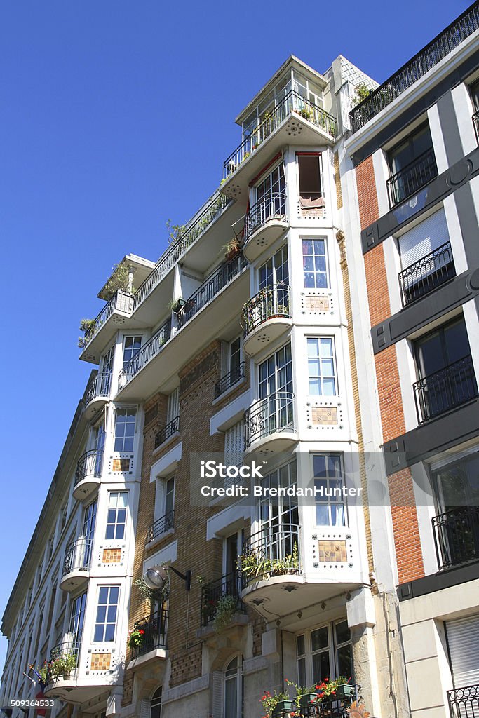 Elegance on the Canal Ornate buildings in Paris. Apartment Stock Photo