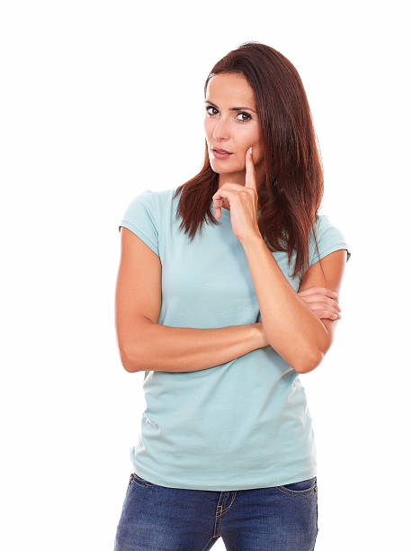istock Pensive beautiful woman looking at you 509365239