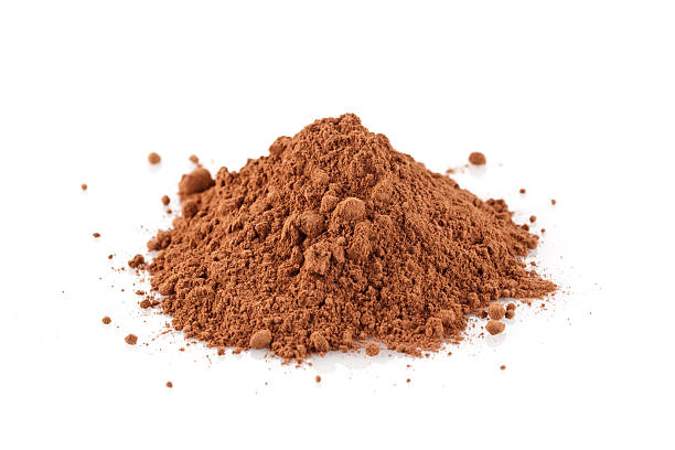 Cocoa Powder Cocoa Powder Heap Isolated on White Background cocoa powder stock pictures, royalty-free photos & images