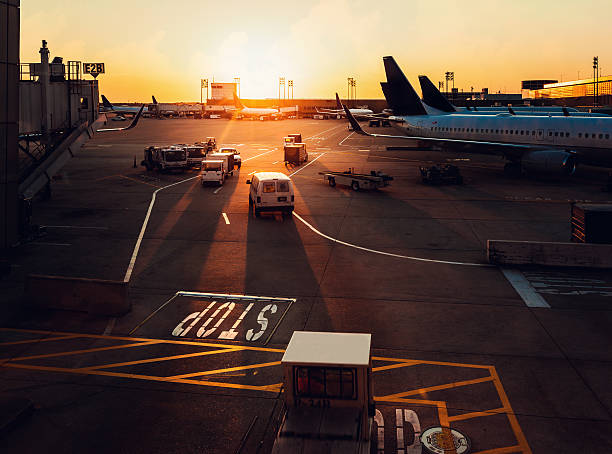 behind the scenes at Houston airport at sunset - planes at the gates
