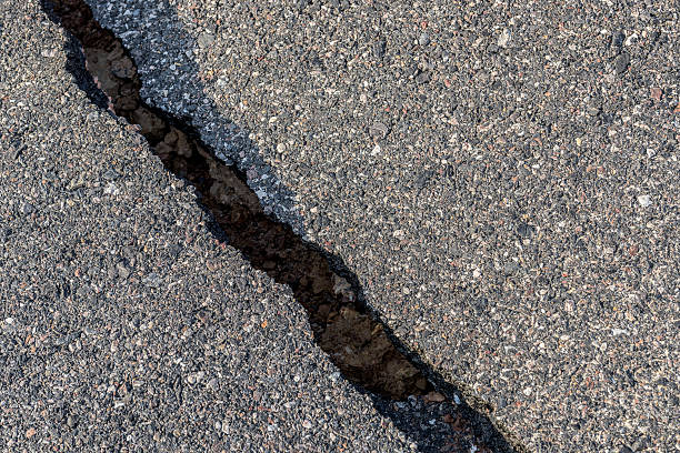 istock Layer of broken asphalt road at rural areas. 509367604