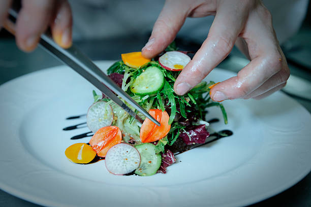 Chef is decorating appetizer Chef is decorating appetizer