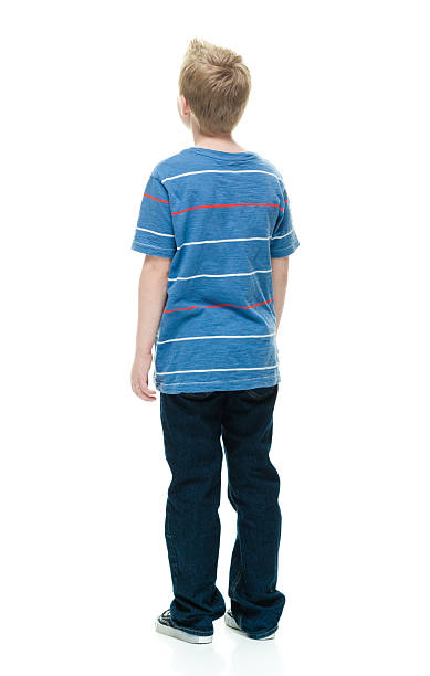 istock Rear view of little boy standing 509367860