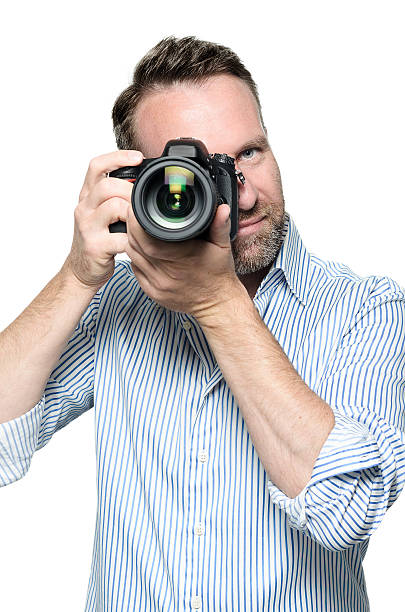istock Male photographer focusing an image 509368216