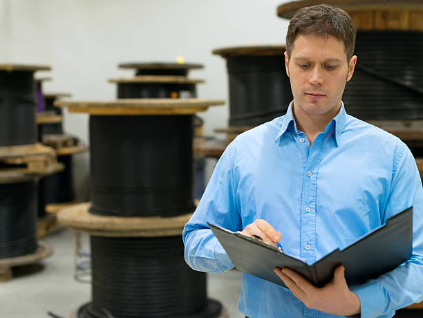 istock Handsome manager at electrical wire and cable factory. 509373648