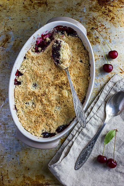 istock sweet cherry crumble cake, top view 509373846