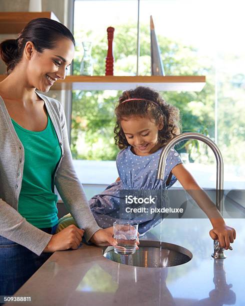 Everyone Needs A Kitchen Helper Stock Photo - Download Image Now - Water, Faucet, Kitchen