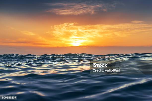 Sunrise And Shining Waves In Ocean Stock Photo - Download Image Now - At The Edge Of, Awe, Backgrounds