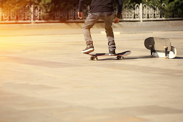 istock young boy skateboarding in the city 509390103