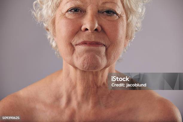 Mature Woman Face With Wrinkled Skin Stock Photo - Download Image Now - Wrinkled, Human Face, Senior Women