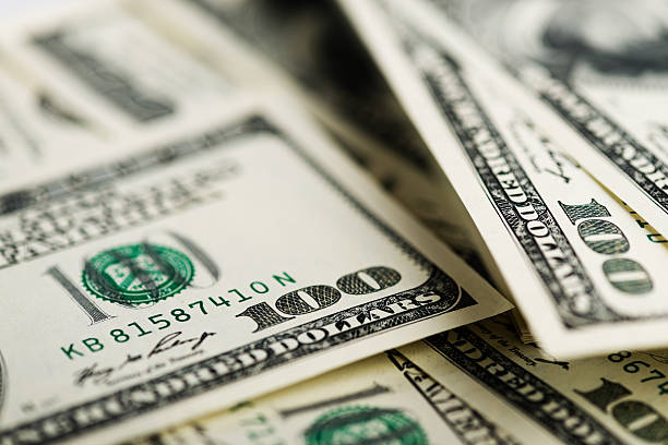 istock Stack of one hundred dollar bills close-up. (shallow DOF) 509391581