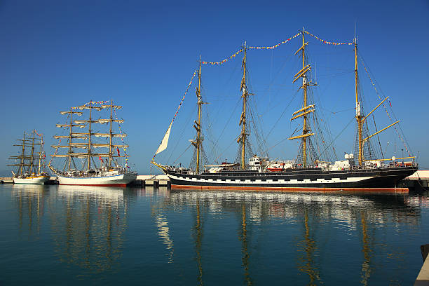 beautiful sailing ships in the harbor