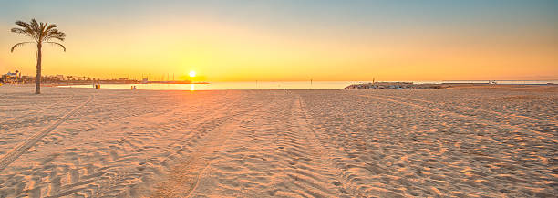 istock Barceloneta Beach in Barcelona at sunrise 509395495