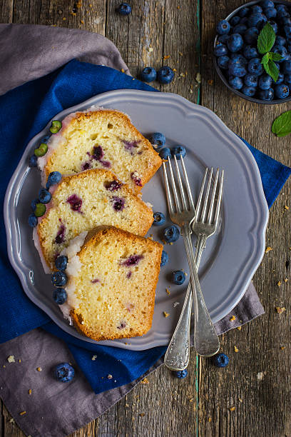 istock blueberry cake with sugar icing and fresh berrie 509406774