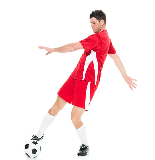 istock Soccer player kicking the ball 509409570
