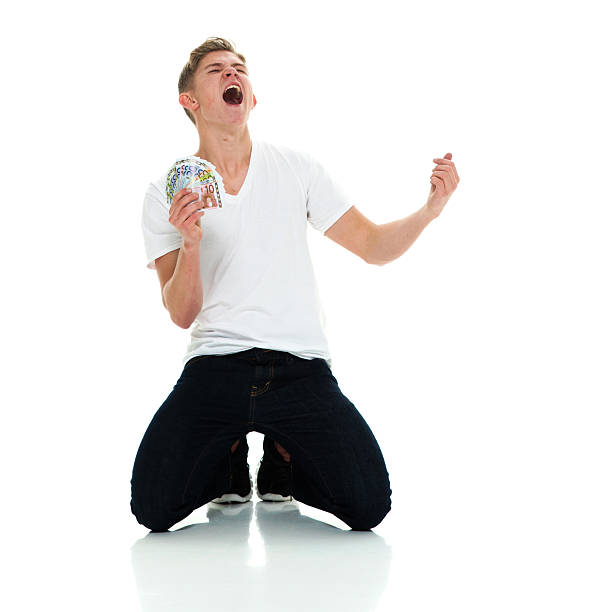 istock Excited male cheering with European currency 509410036