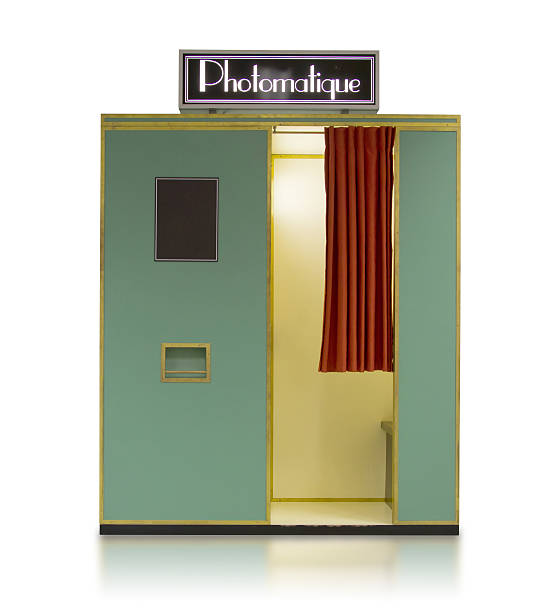 Vintage style photo booth vending machine on a white background stock photo