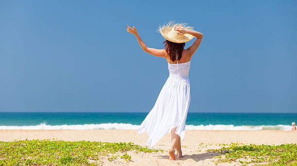 istock woman near the ocean 509414298