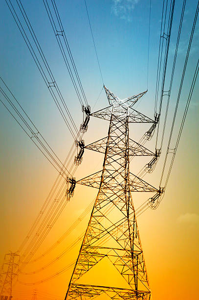 electric pylon - power cable photography vertical nobody stock-fotos und bilder